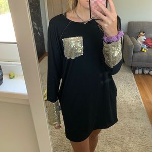 Black and gold sequin dress